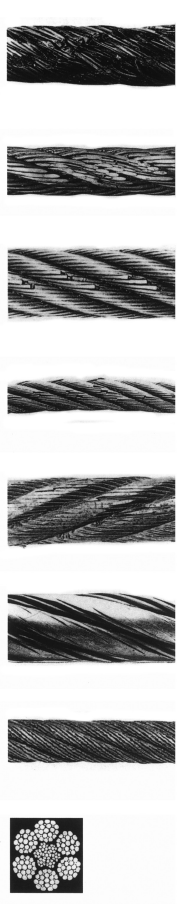 Close-up of broken wires and wear on a steel wire rope near termination